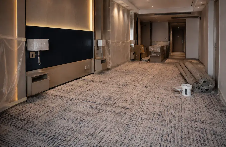 Hospitality fit-out flooring on a UAE hotel project with carpet and LVT