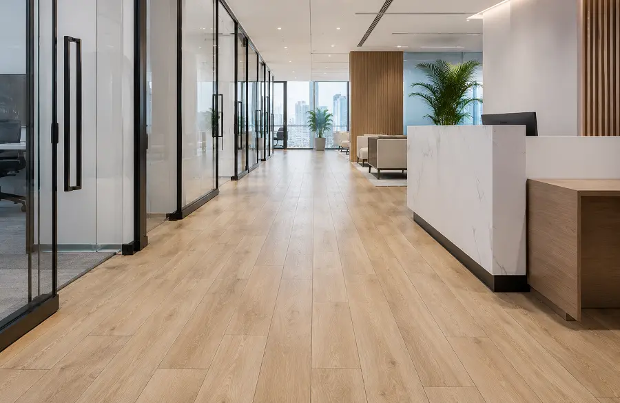 Commercial LVT flooring in a UAE office reception and circulation zone